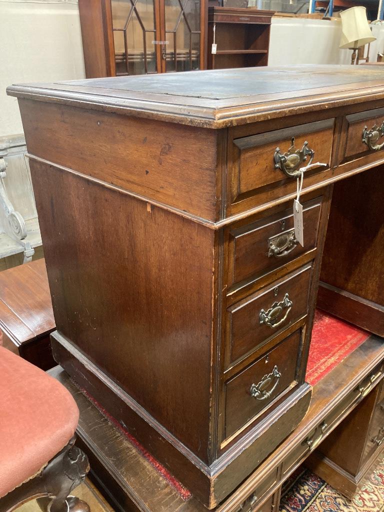 A late Victorian walnut kneehole desk, length 106cm, depth 60cm, height 74cm